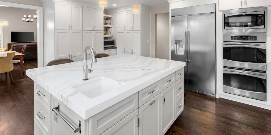 multifunctional kitchen island in modern white kitchen