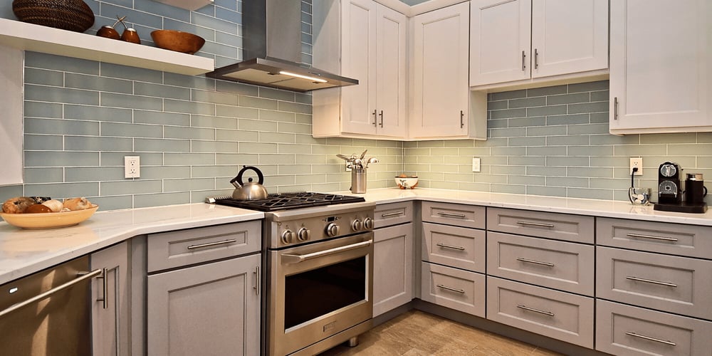 Kitchen Remodel with Drawer Storage and Blue Tile Backsplash in Sarasota by Gilbert Design Build