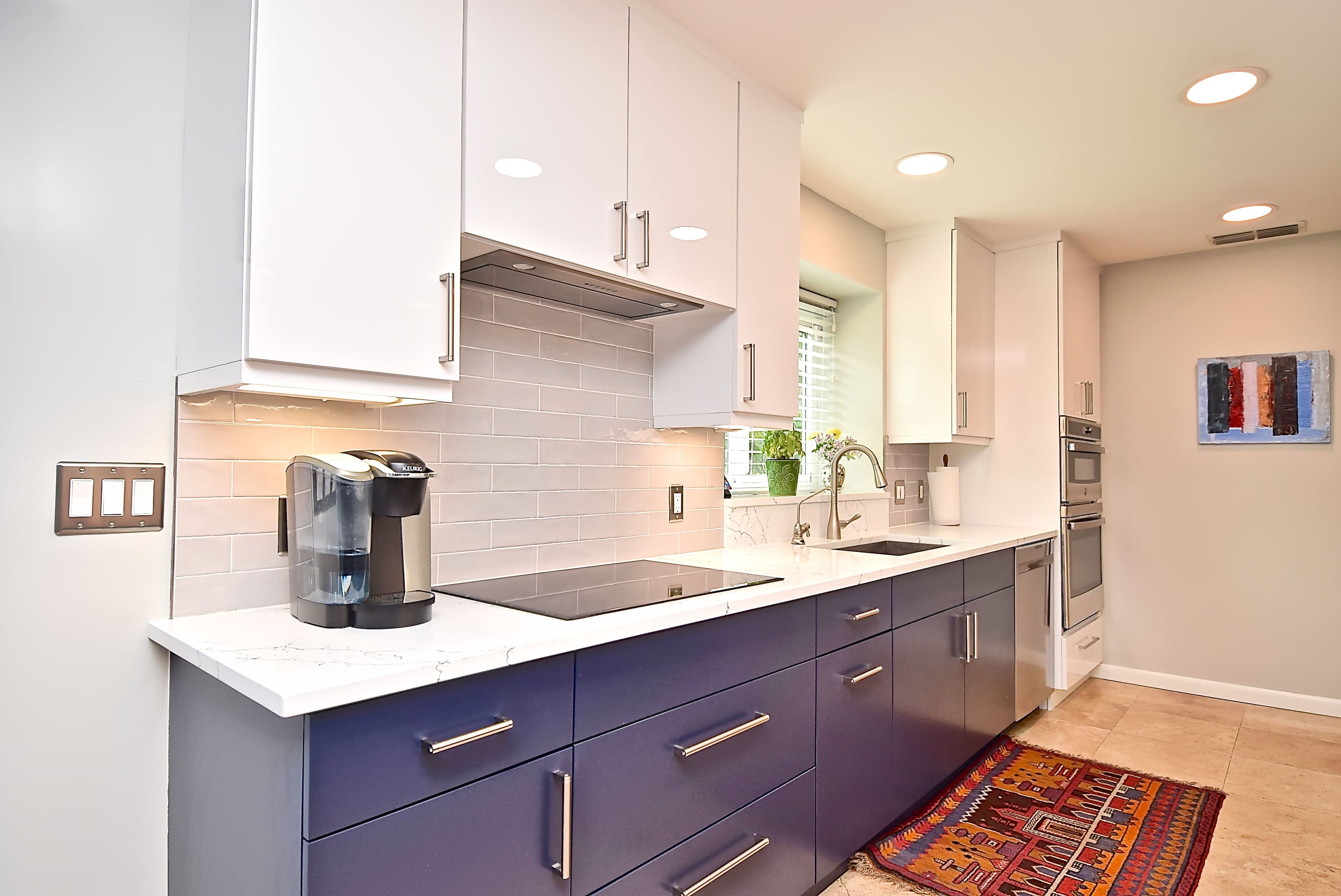 Blue Lower Cabinets White Upper Cabinets in Sarasota Galley Kitchen