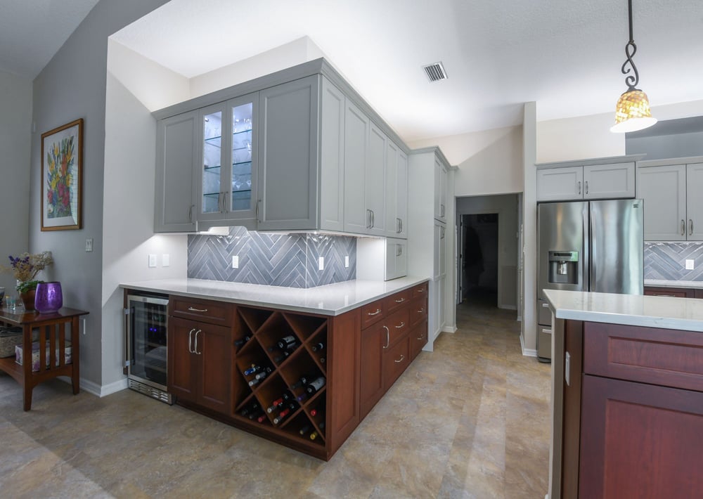 Custom Built In Wine Bar and Fridge in Kitchen Renovation in Sarasota Home with Cherry Cabinets