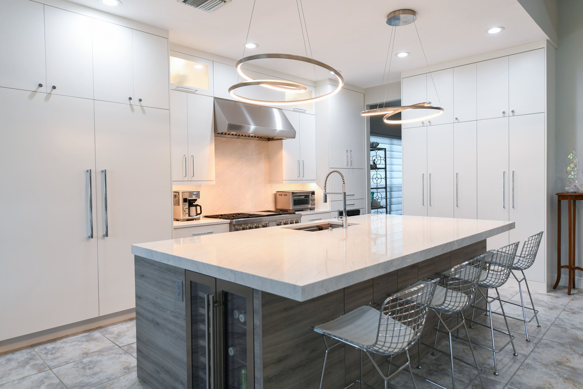 Integrated Appliances in Sleek and Stylish Modern White Kitchen in Sarasota