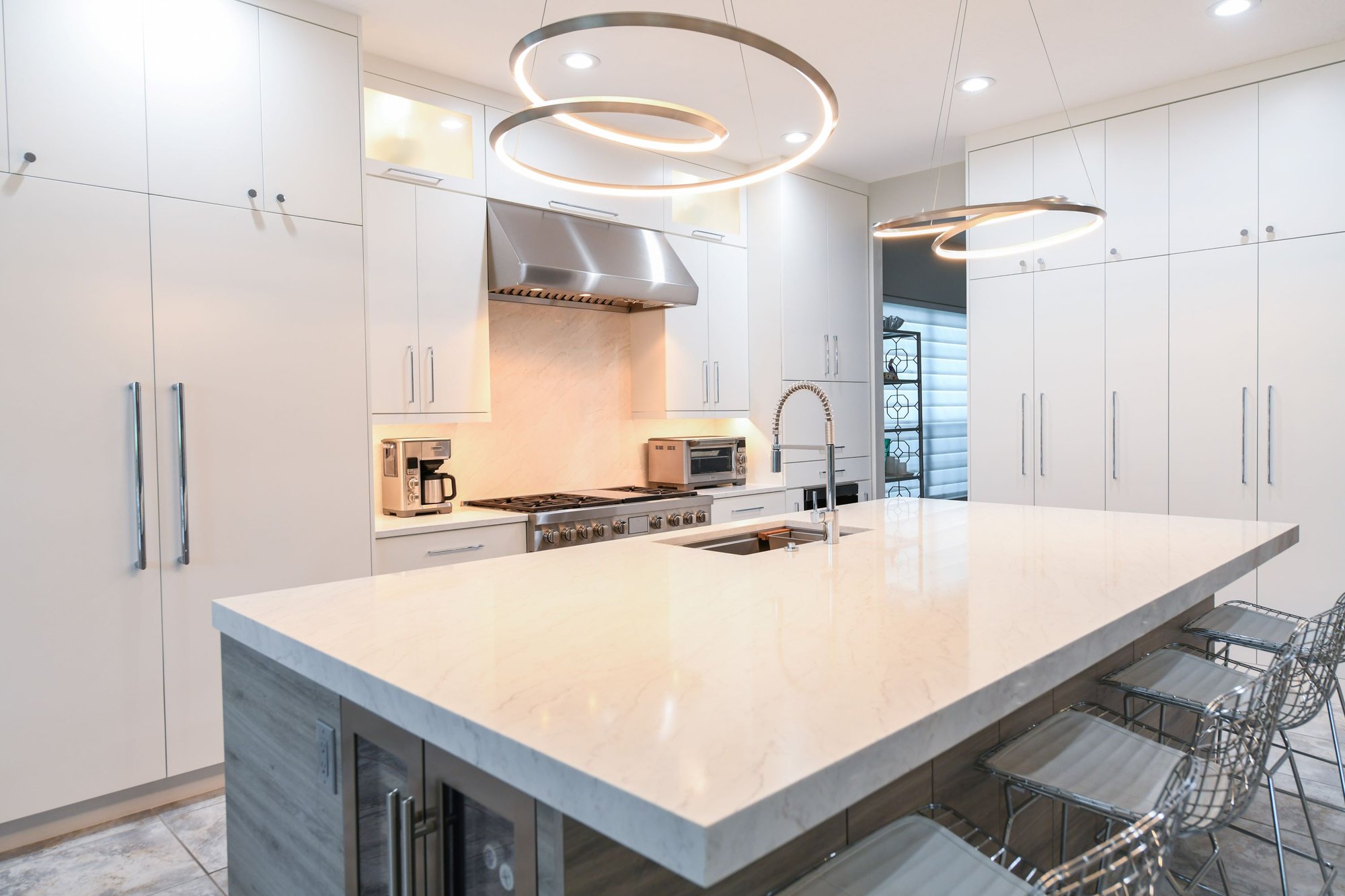 White Modern Kitchen Remodel with Modern Light Fixtured