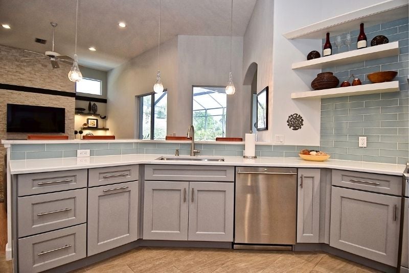 light gray shaker style cabinets with stainless steel appliances