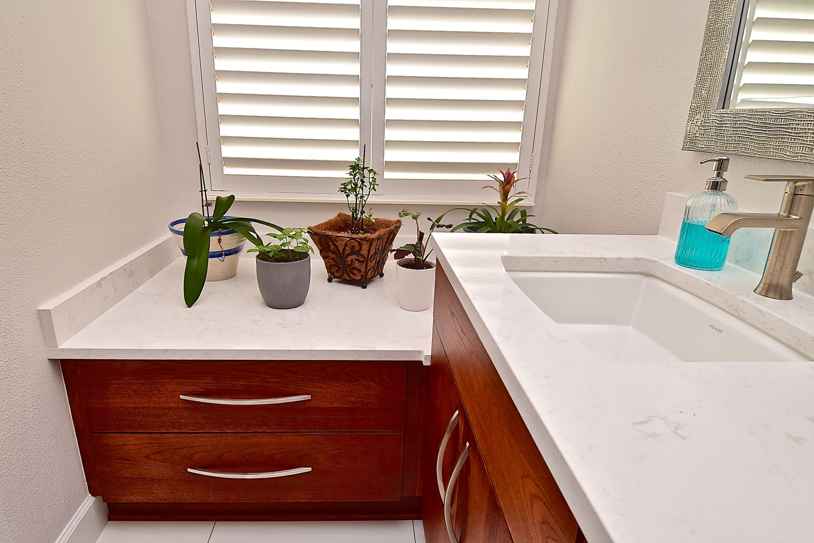 Double Vanity Sarasota Bathroom Remodel with Counter for Plants