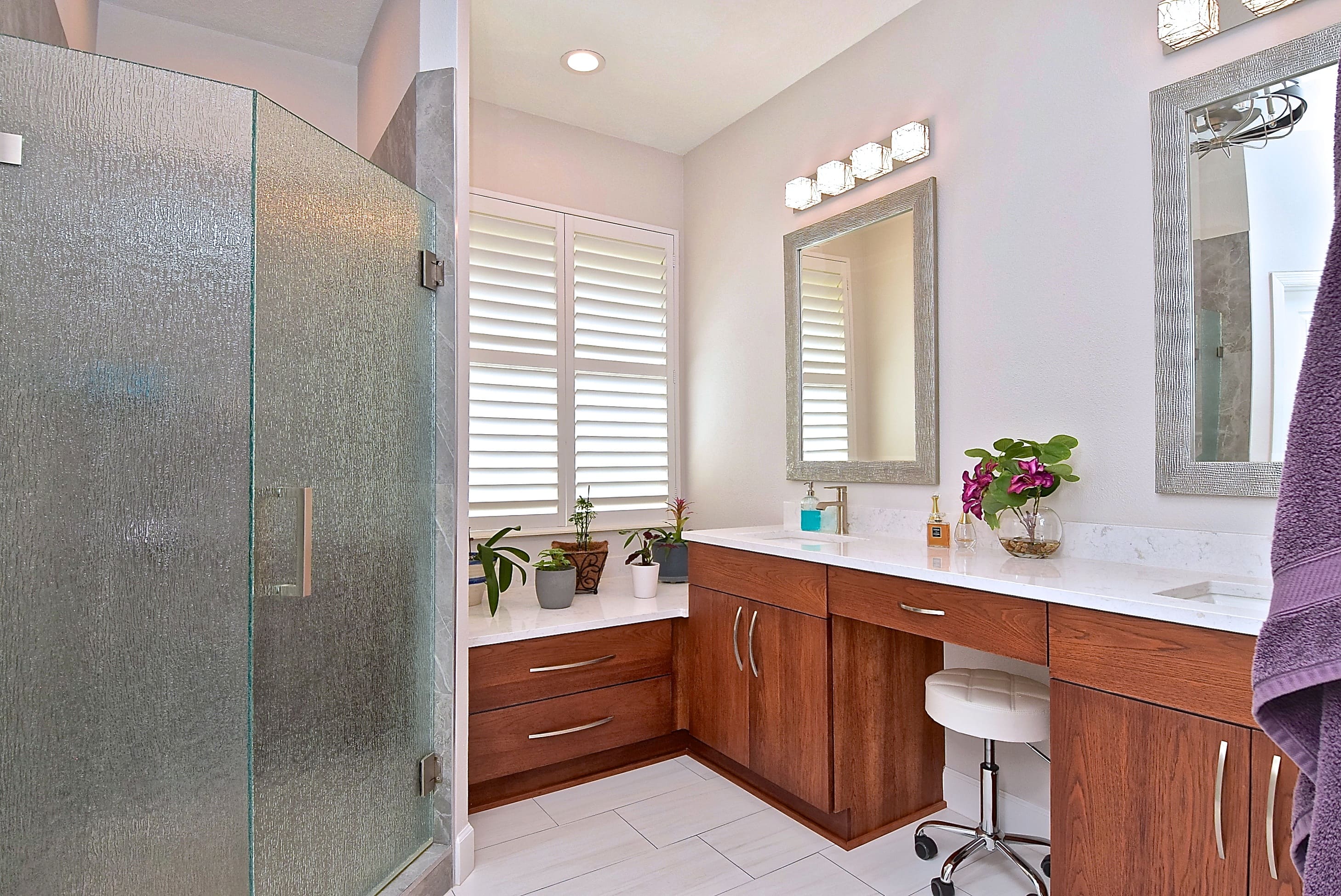 Walk In Shower and Double Natural Warm Wood Vanity with Twin Mirrors in Sarasota Bathroom Remodel
