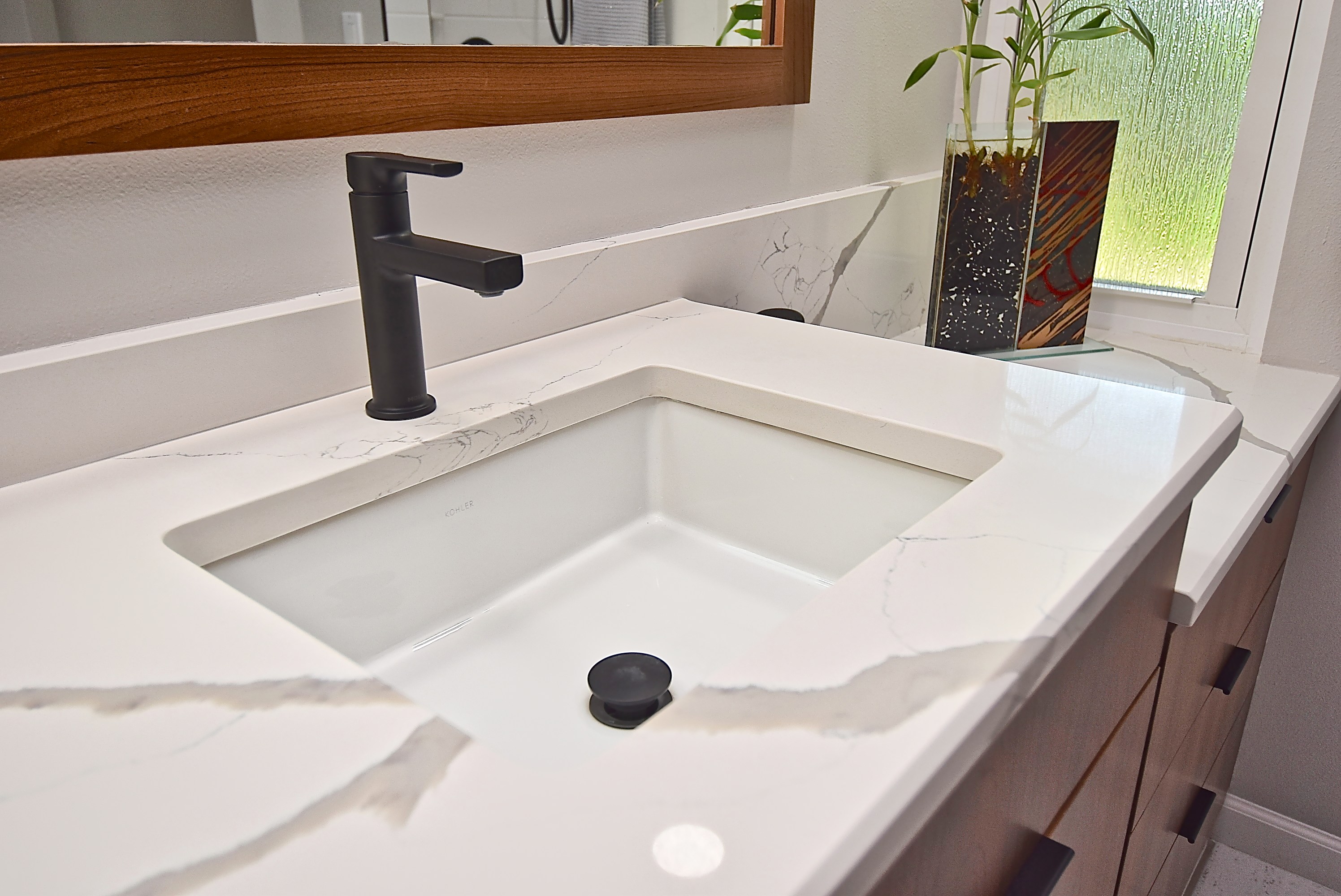 Undermount Sink with Modern Mate Black Fixtures in Modern Sarasota Bathroom Remodel
