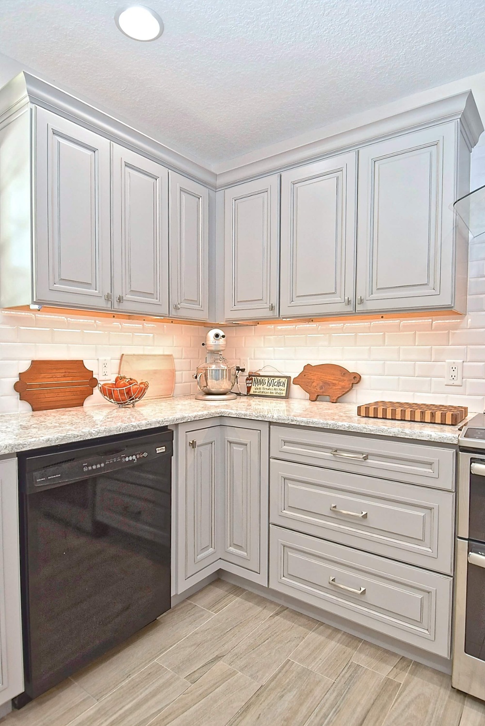 Gray corner kitchen cabinets in kitchen remodel