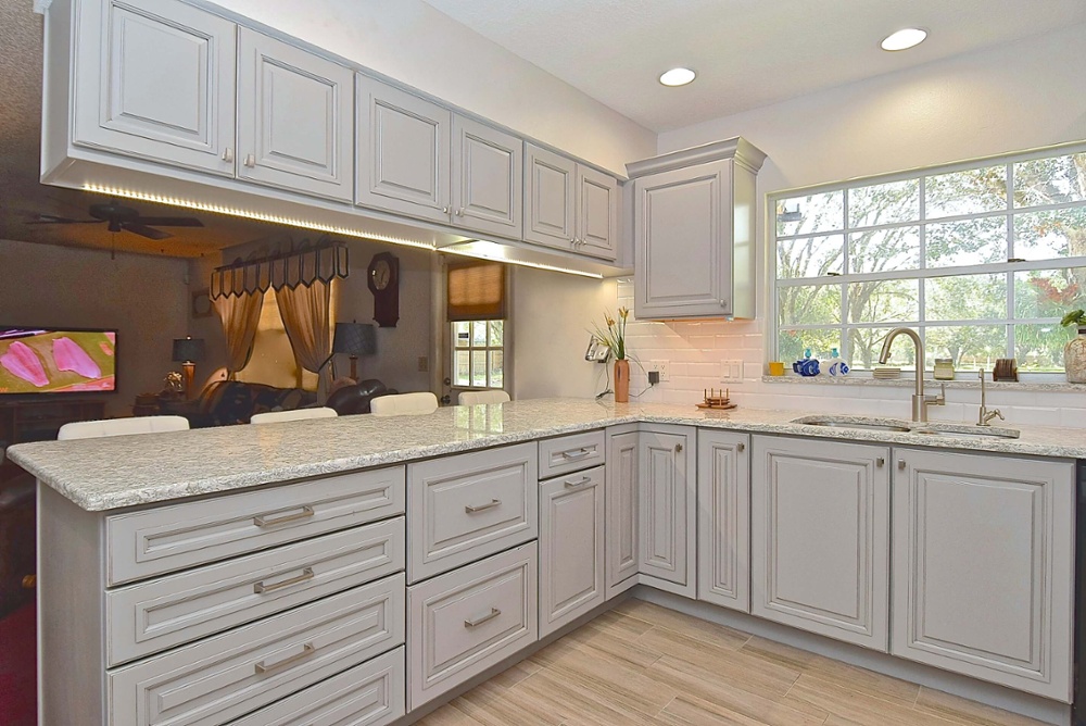 Open gray kitchen remodel with plenty of storage