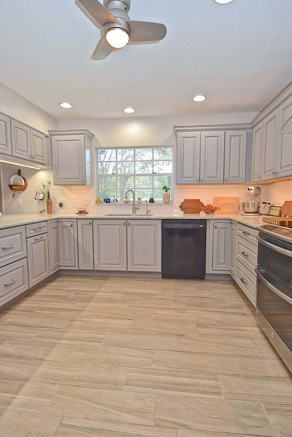 U shaped gray kitchen remodel