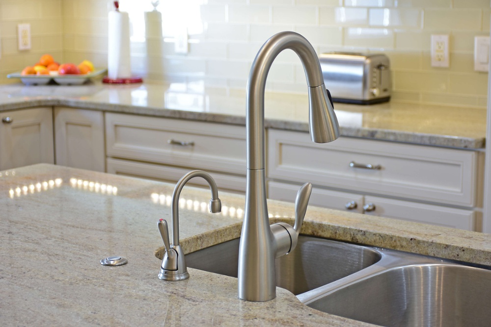 Bright kitchen sink and faucet remodel