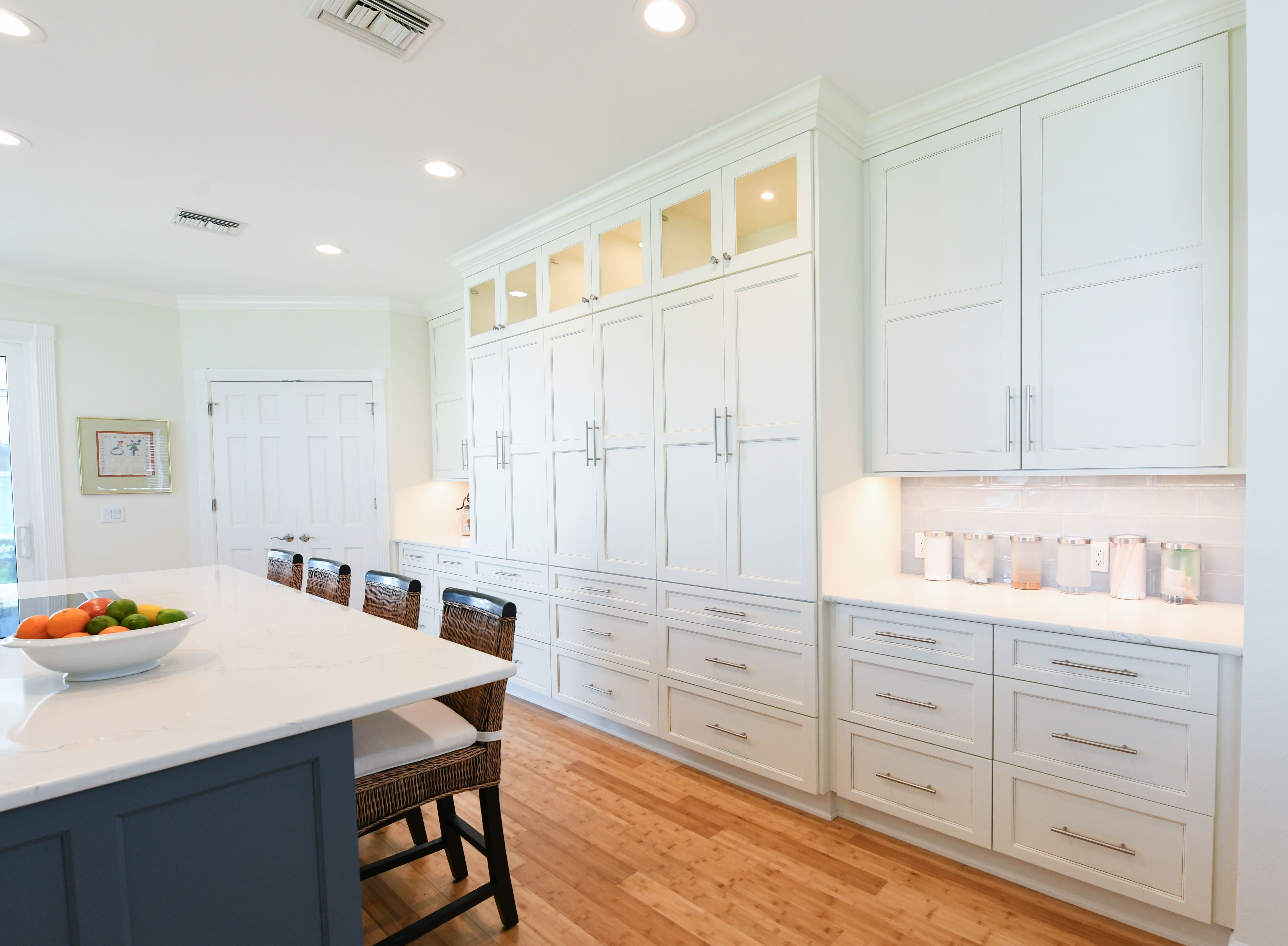 Island Seating in Renovated Sarasota Kitchen with Wall of Storage and Coffee Bar