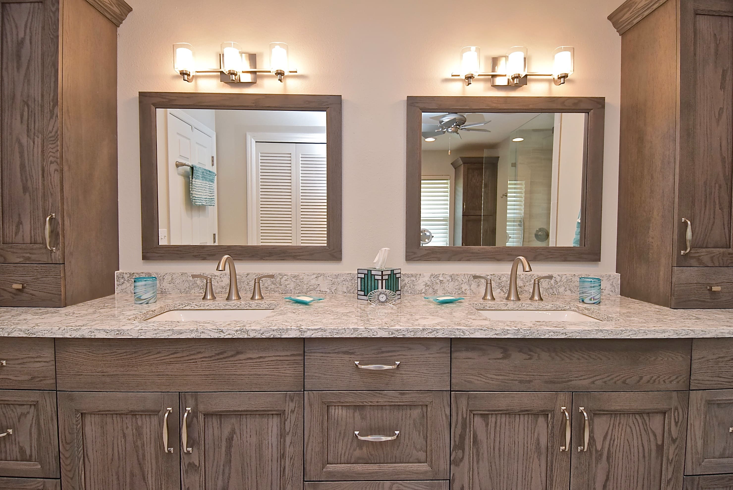 Warm Wood Grain Gray Vanity with Double Sinks in Bradenton Bathroom Renovation
