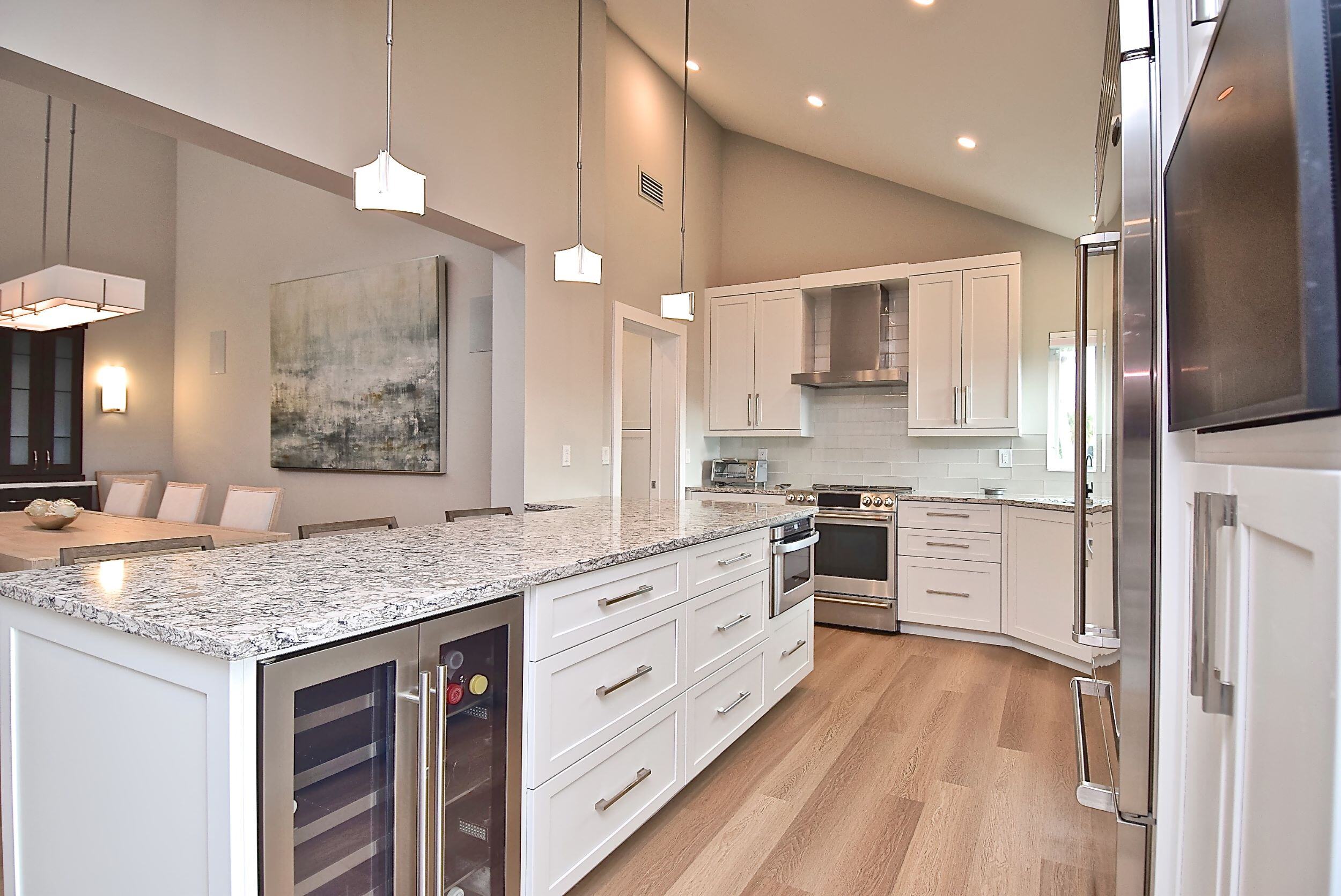 Large Custom Kitchen Island with Drawers and Wine Fridge in Bradenton Remodel